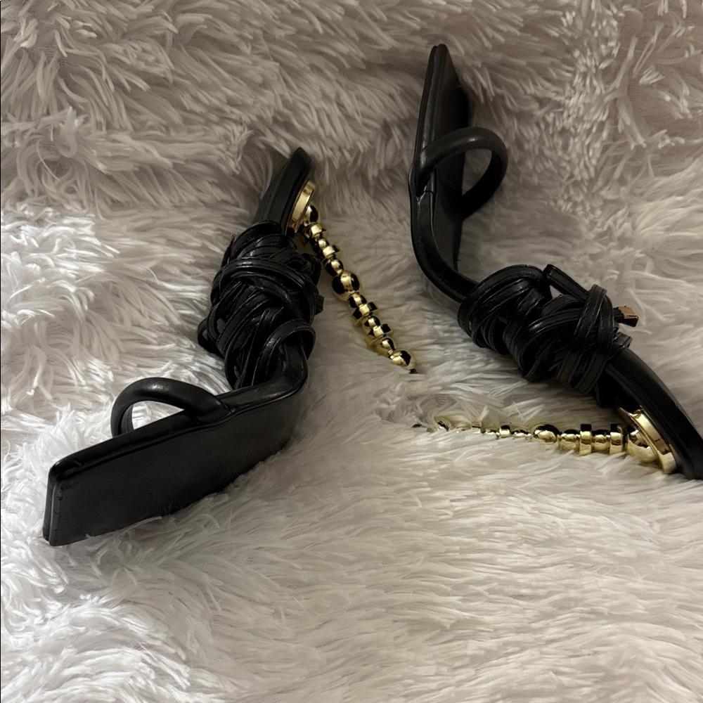 Black Strappy Heeled Sandals with Gold Accented heel, approximately 5” high.
